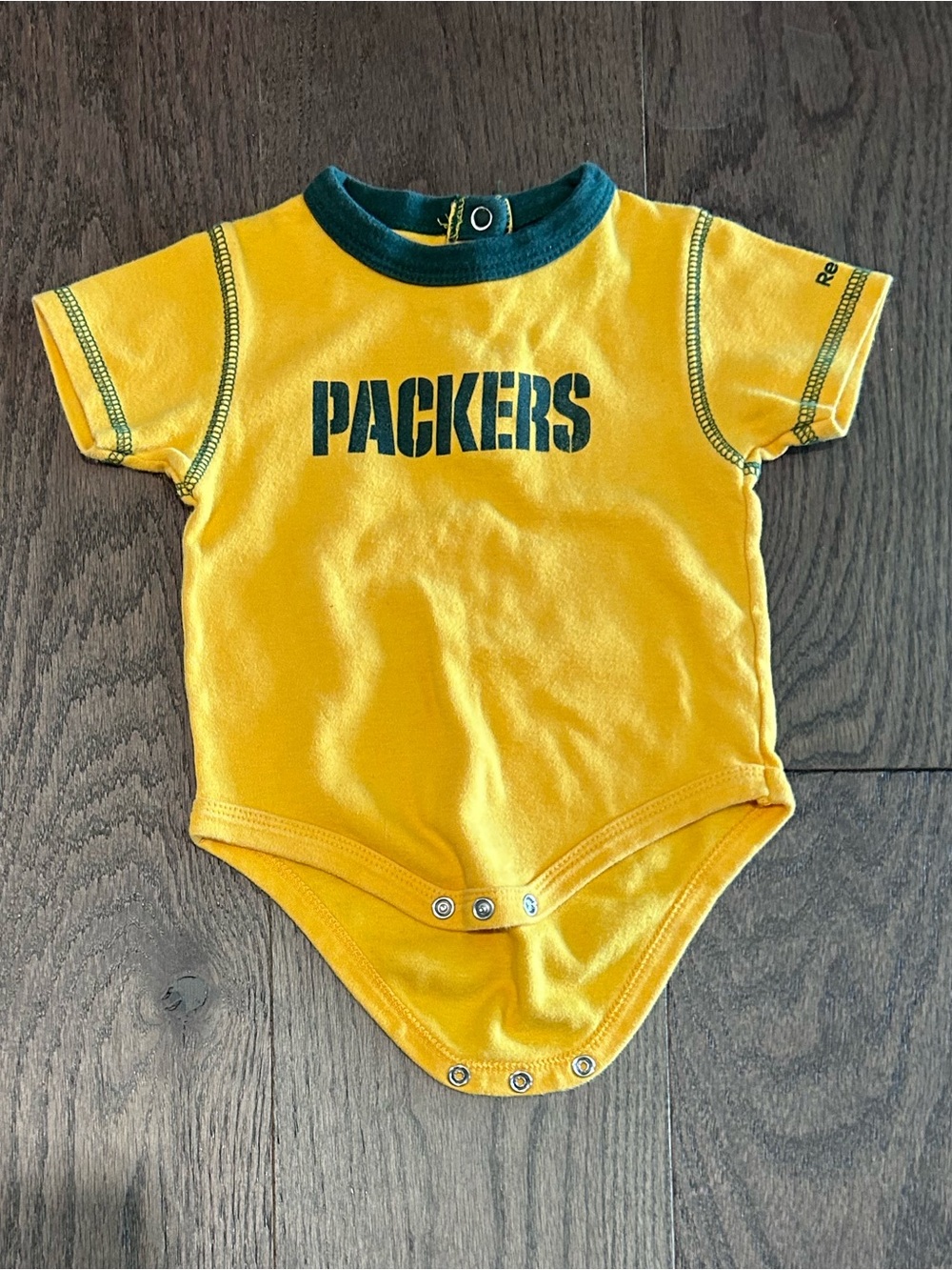 Green Bay Packers Size 6-9 month Baby Reebok Bodysuit